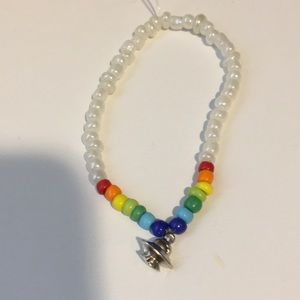 White braclet  and silver alien spaceship